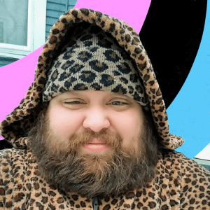 a picture of Billy, a light-skinned Latinx person wearing all leopard print